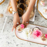 placing cupcake on tray